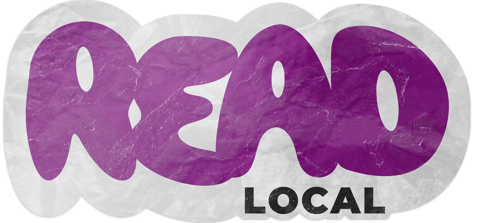 Worn our sticker, with the words Read Local