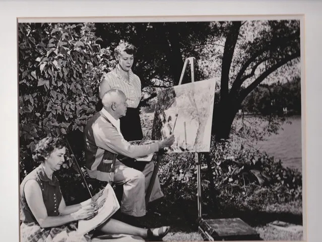 Black and white photo from the south bend tribune which features the Hartig-Zimmerman family who were professional painters. 
